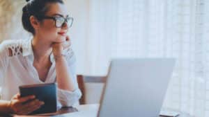 High net worth couple reviewing a prenuptial agreement with a Chicago attorney