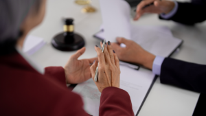 Parent comforting child while reviewing legal documents about paternity in Illinois