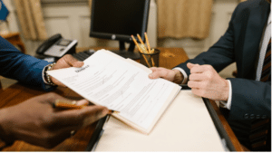 father reviewing parenting records with Illinois divorce attorney